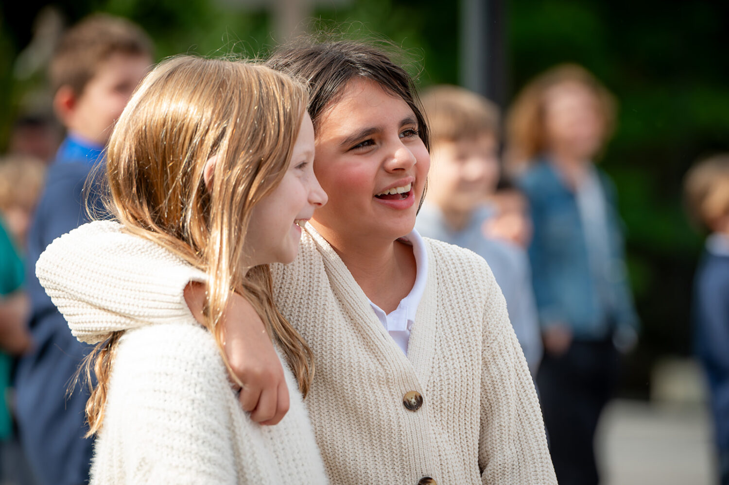 Two girls with arm around eachother