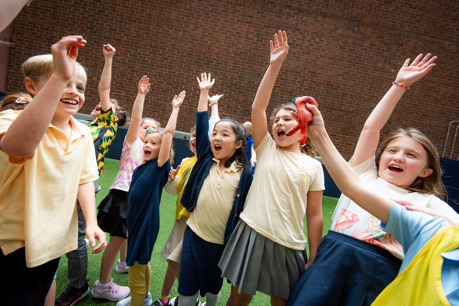 Students putting their hands up