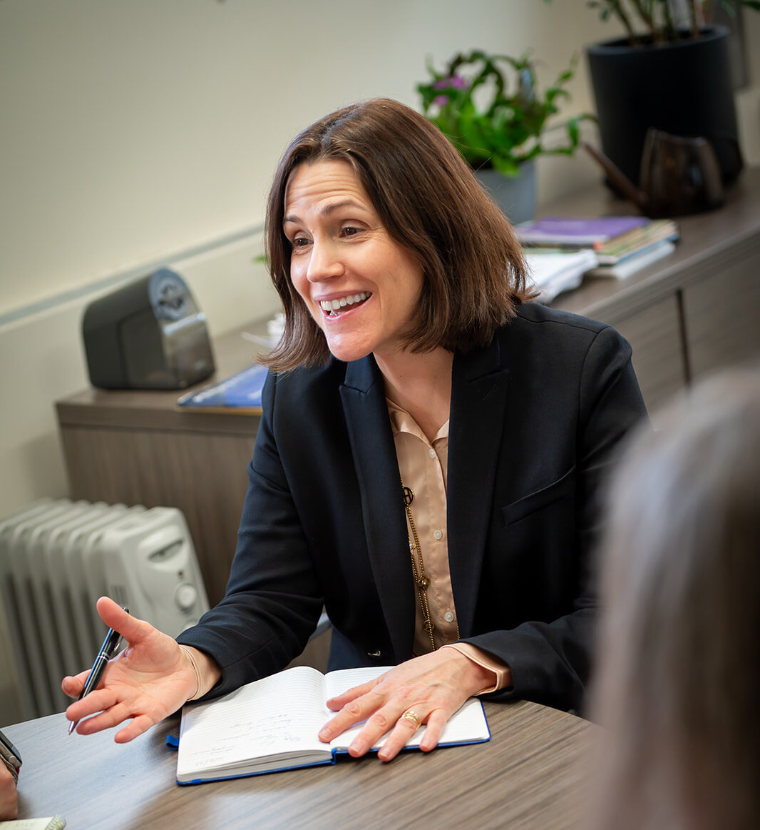 Teacher talking to other staff